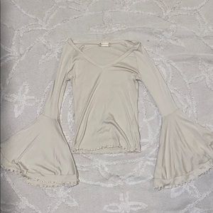 Cream long sleeve top with flared sleeves